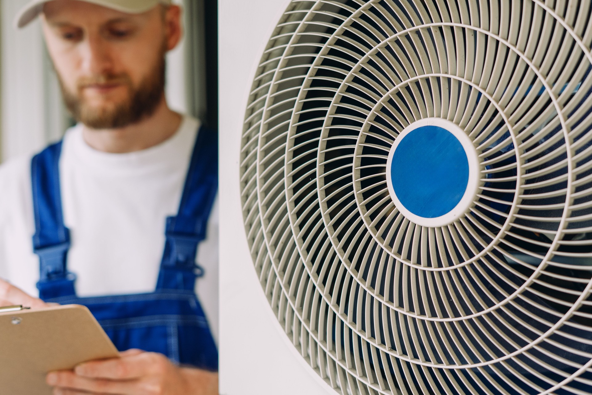 Expert maintenance service for air conditioning unit in residential apartment